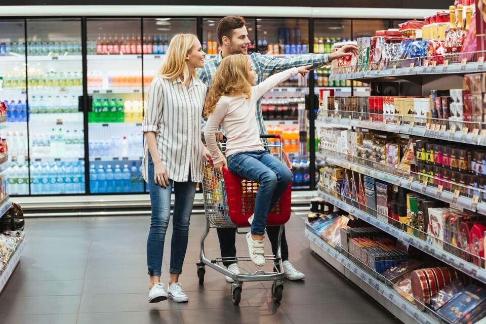 [freepicdownloader.com]-cheery-little-girl-sitting-shopping-cart-large